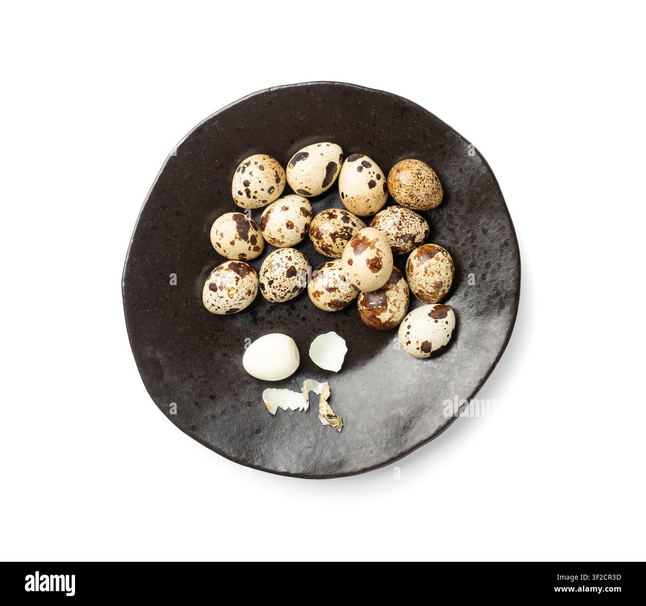 Quail Eggs Isolated, Diet Egg on Black Plate, Healthy Breakfast, Natural Organic Nutrition, Salad Ingredient Spotted Quail Egg on White Background Stock Photo