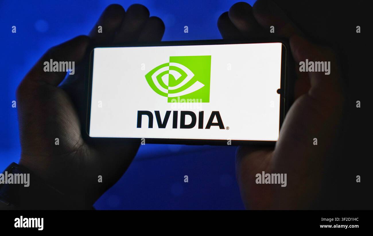 Nvidia tech company logo on a device screen Stock Photo