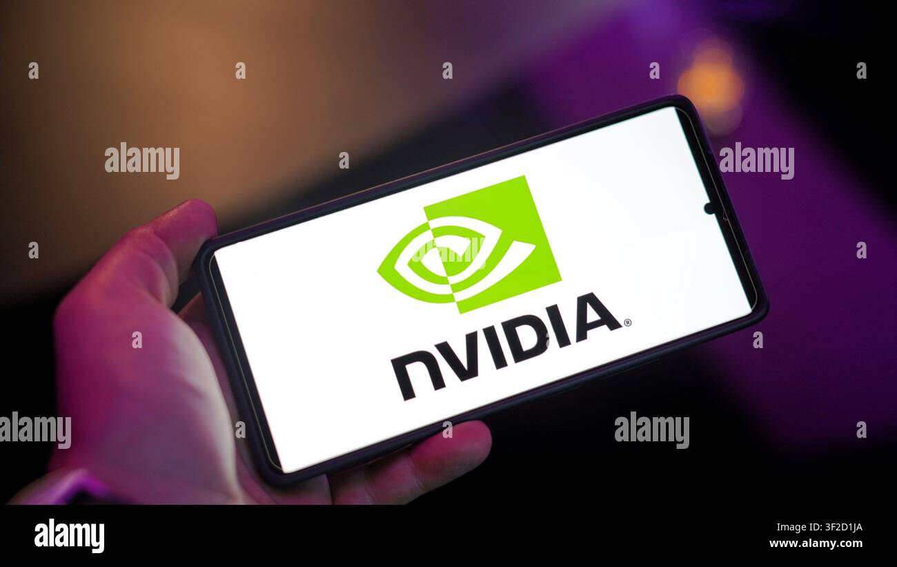 Nvidia tech company logo on a device screen Stock Photo