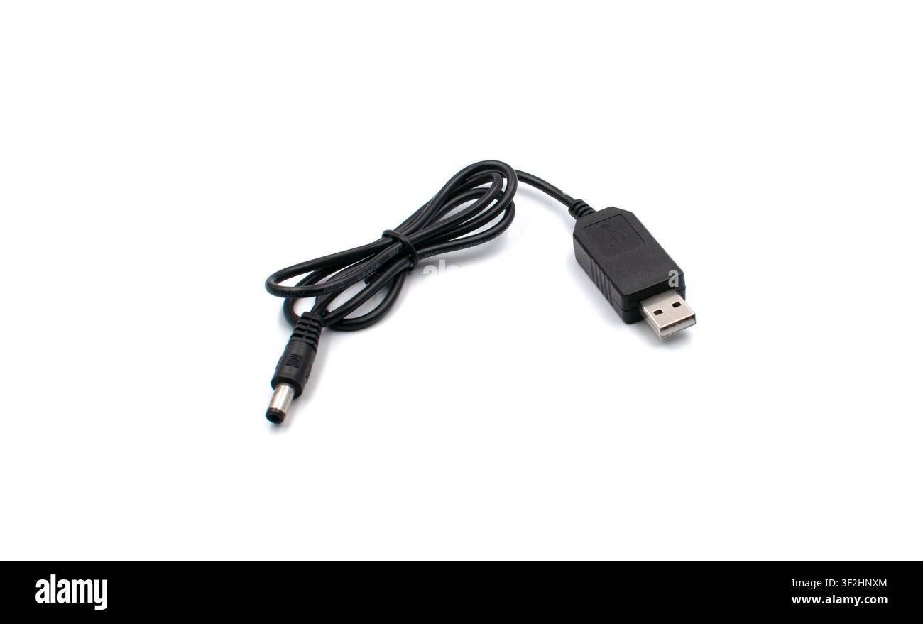 Black USB to DC power charging cable isolated on white background Stock Photo