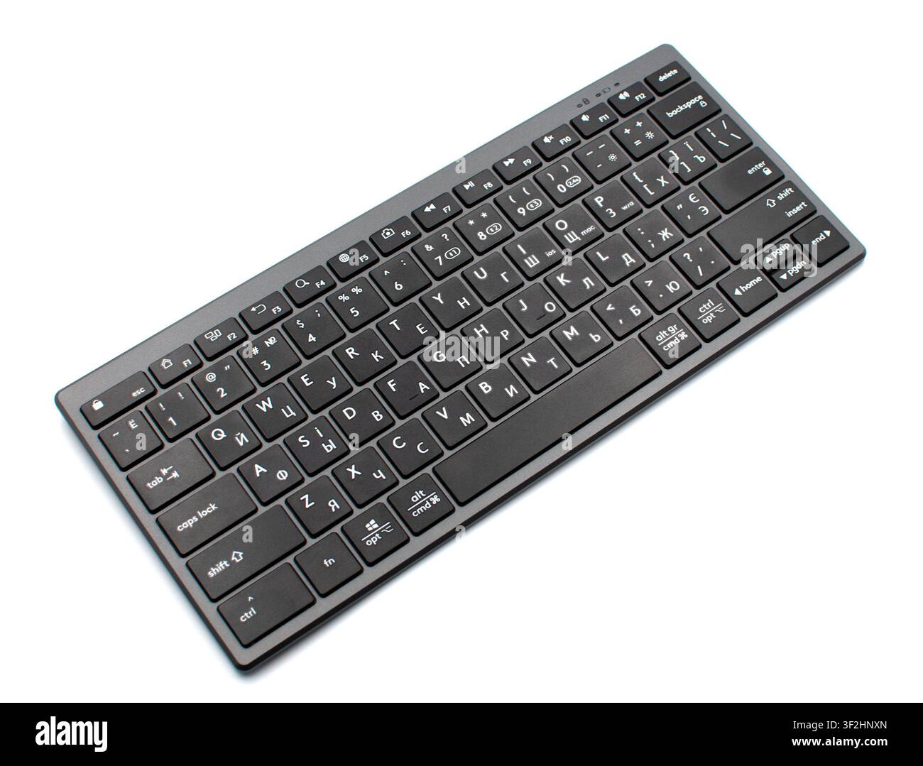 Modern compact wireless computer keyboard isolated on white background Stock Photo