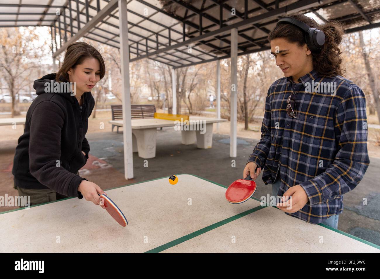 Two Students Playing Table Tennis Together Stock Photo