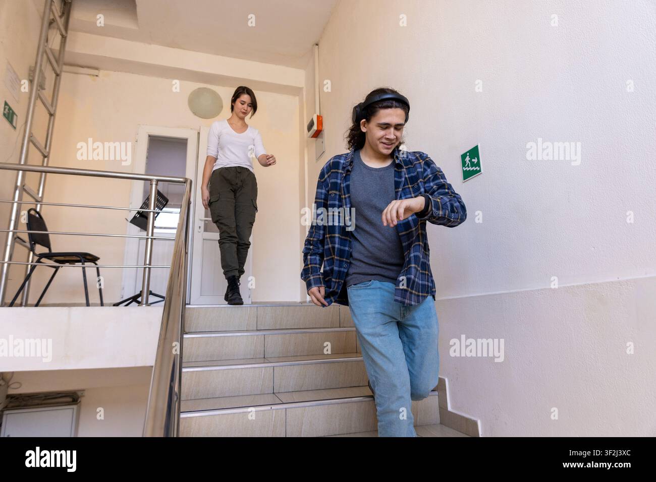 Students walking down the stairs Stock Photo