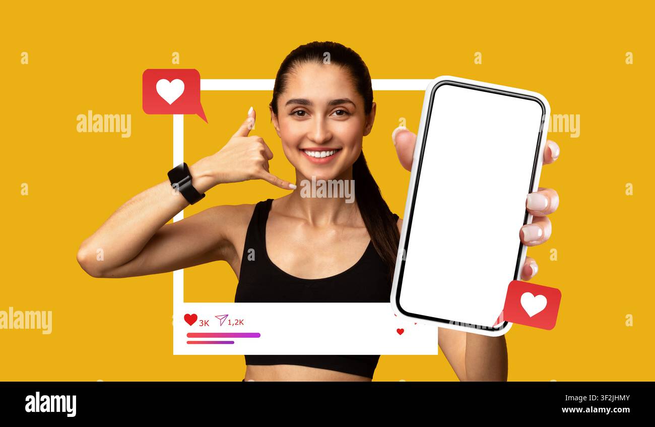 Smiling Young Asian Woman Holding Smartphone And Making Call Gesture, Gym Setting, Technology Concept Stock Photo