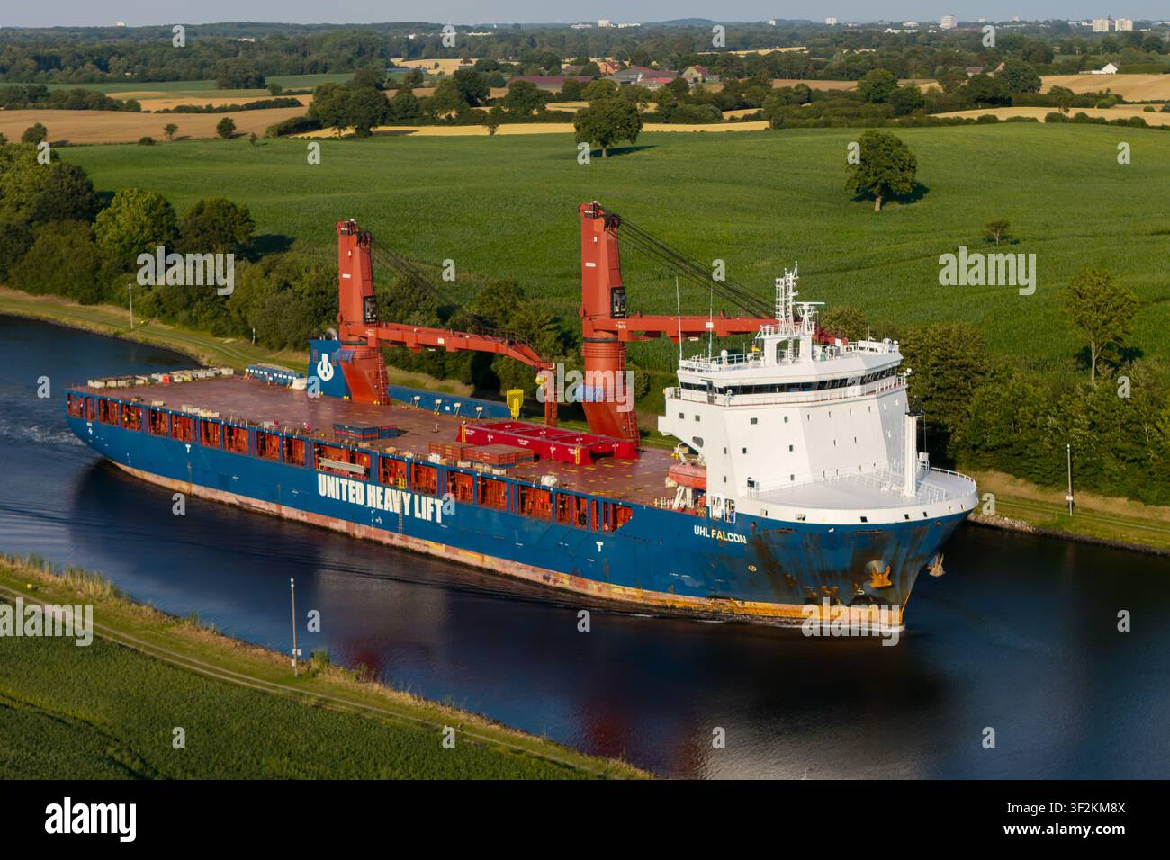 Heavy lift ship UHL FALCON passing the Kiel canal Stock Photo