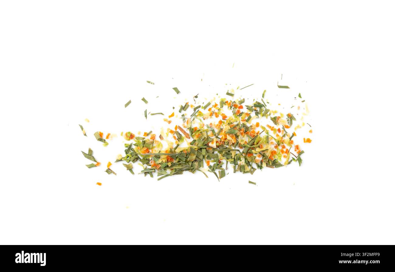 Dried vegetable mix isolated. Dehydrated greens, onion, carrot pieces, seasoning chips, flakes blend on white background Stock Photo