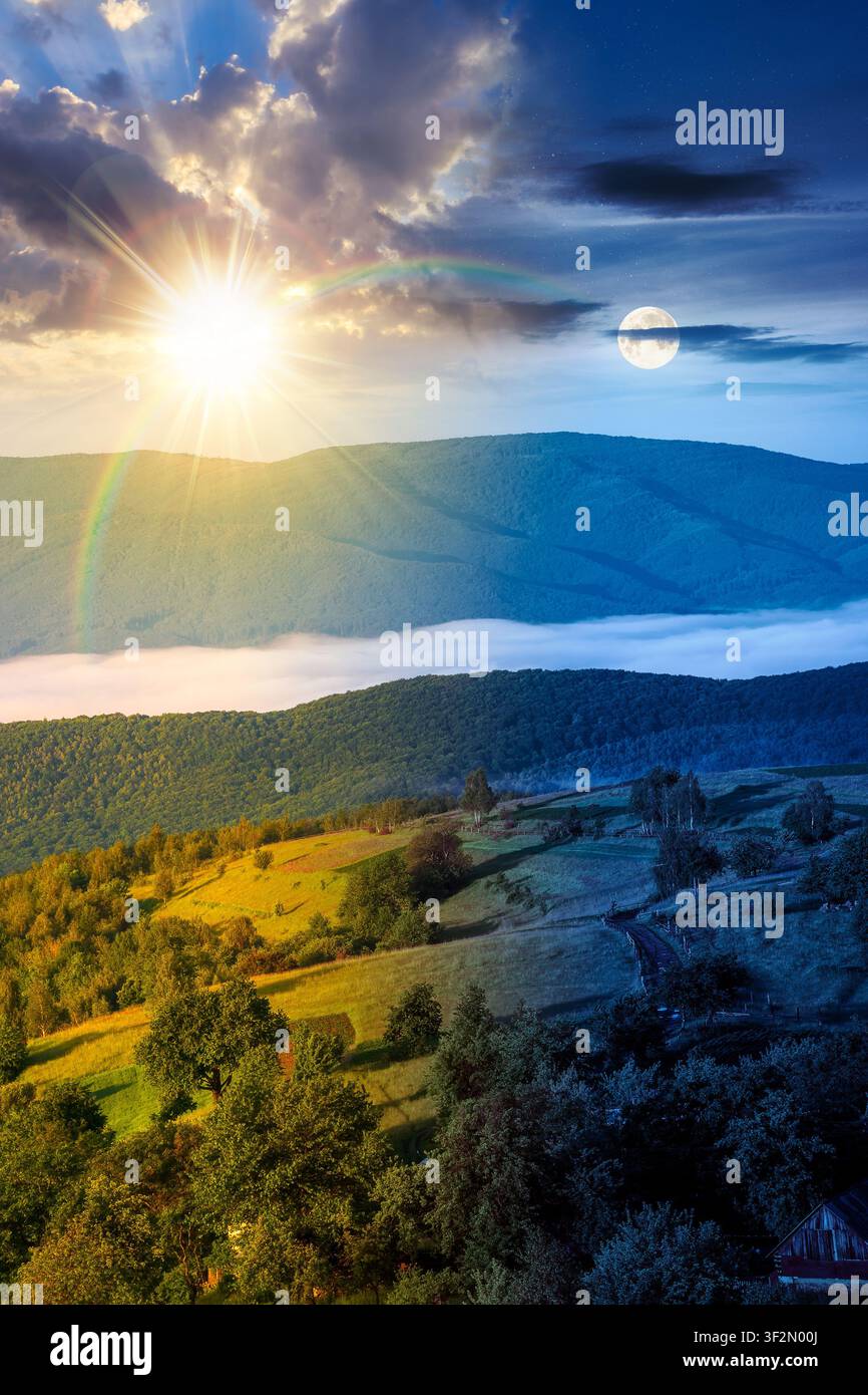 foggy carpathian mountain landscape. day meet night. outdoor adventure with stunning view. sun and moon in harmony over mountainous countryside of ukr Stock Photo