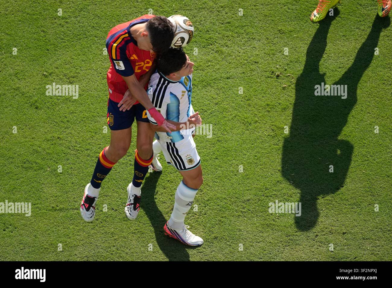 spain-s-pau-cubarsi-22-jumps-for-the-ball-with-argentina-s-julian