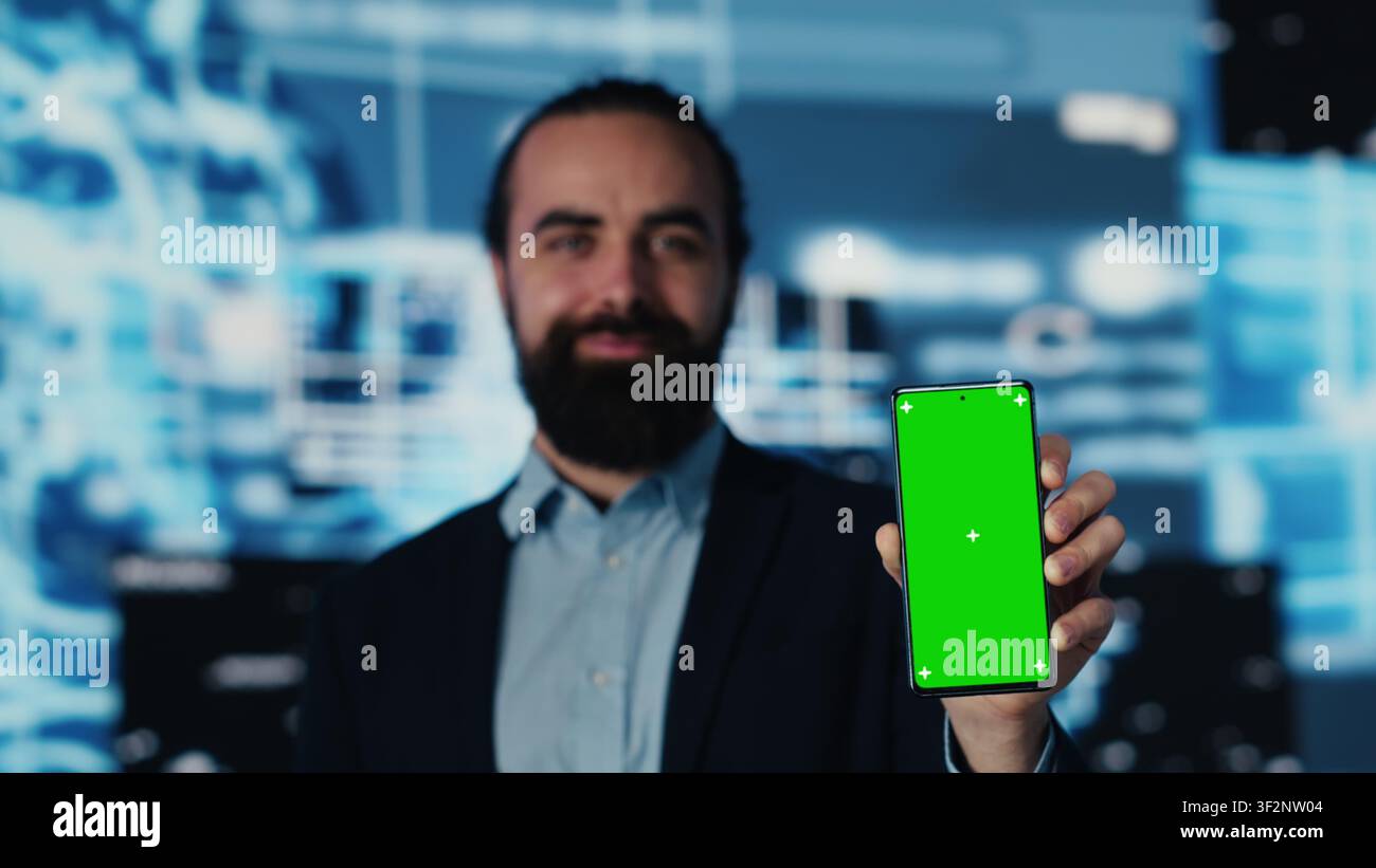 Business manager uses mockup screen next to AI neural networks, working with machine learning and cloud computing systems. Young man implementing artificial intelligence. Camera A. Stock Photo
