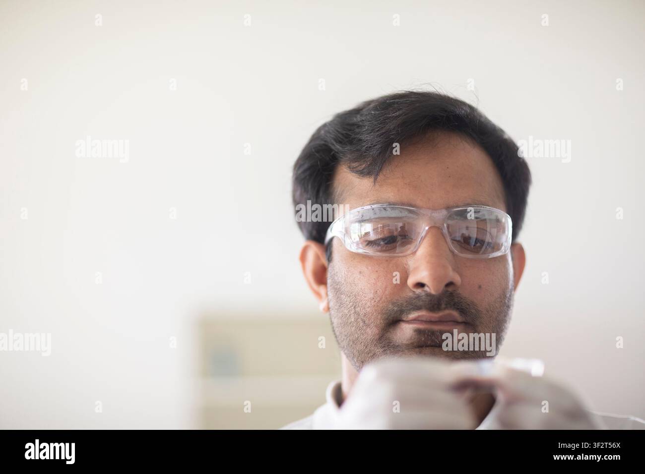 scientist male working in a laboratory Stock Photo