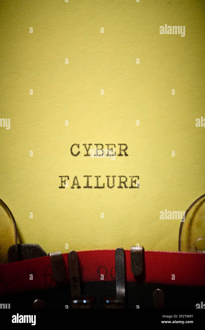 Cyber failure text written with a typewriter. Security breach in the computer system. Stock Photo