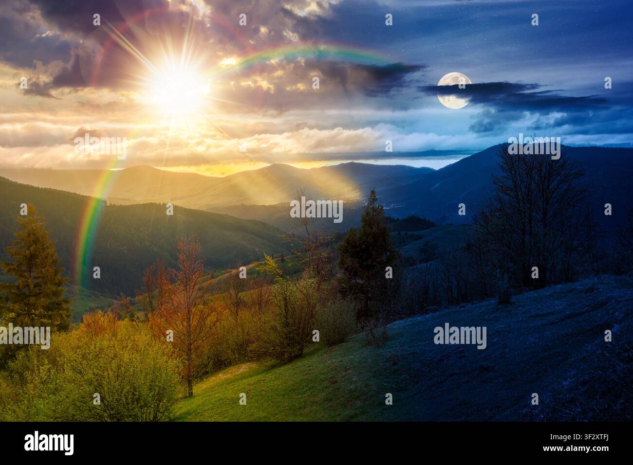 day meet night. mountainous countryside scenery. epic sky view above the valley. sun and moon over green fields and trees on the hills. nature scenery Stock Photo