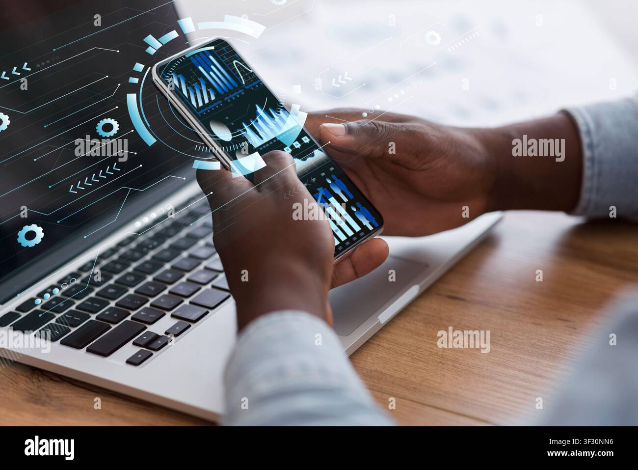 Businessman using smart phone with holograms datas Stock Photo