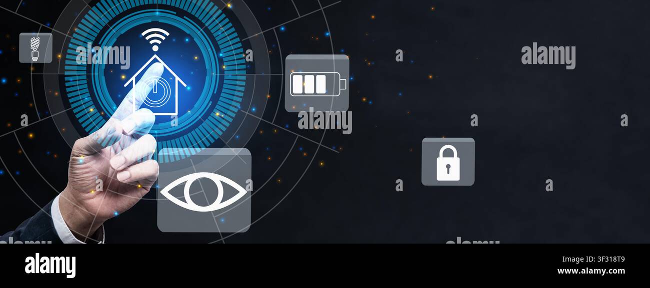 A hand interacts with a futuristic smart home control panel featuring icons for security, lighting, energy, and surveillance against a dark, tech-orie Stock Photo