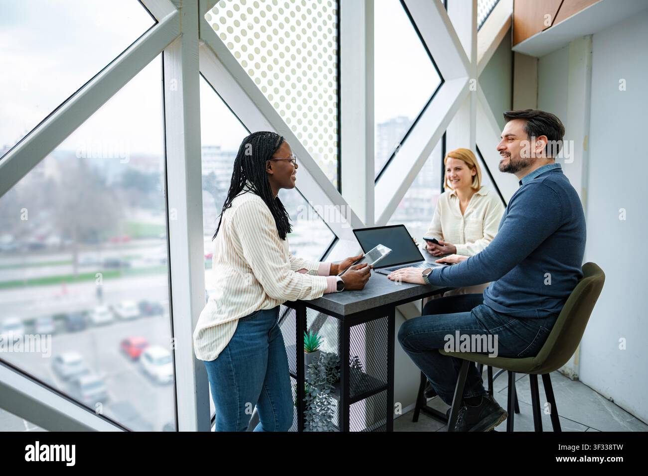 Professional diverse business team meeting together Stock Photo
