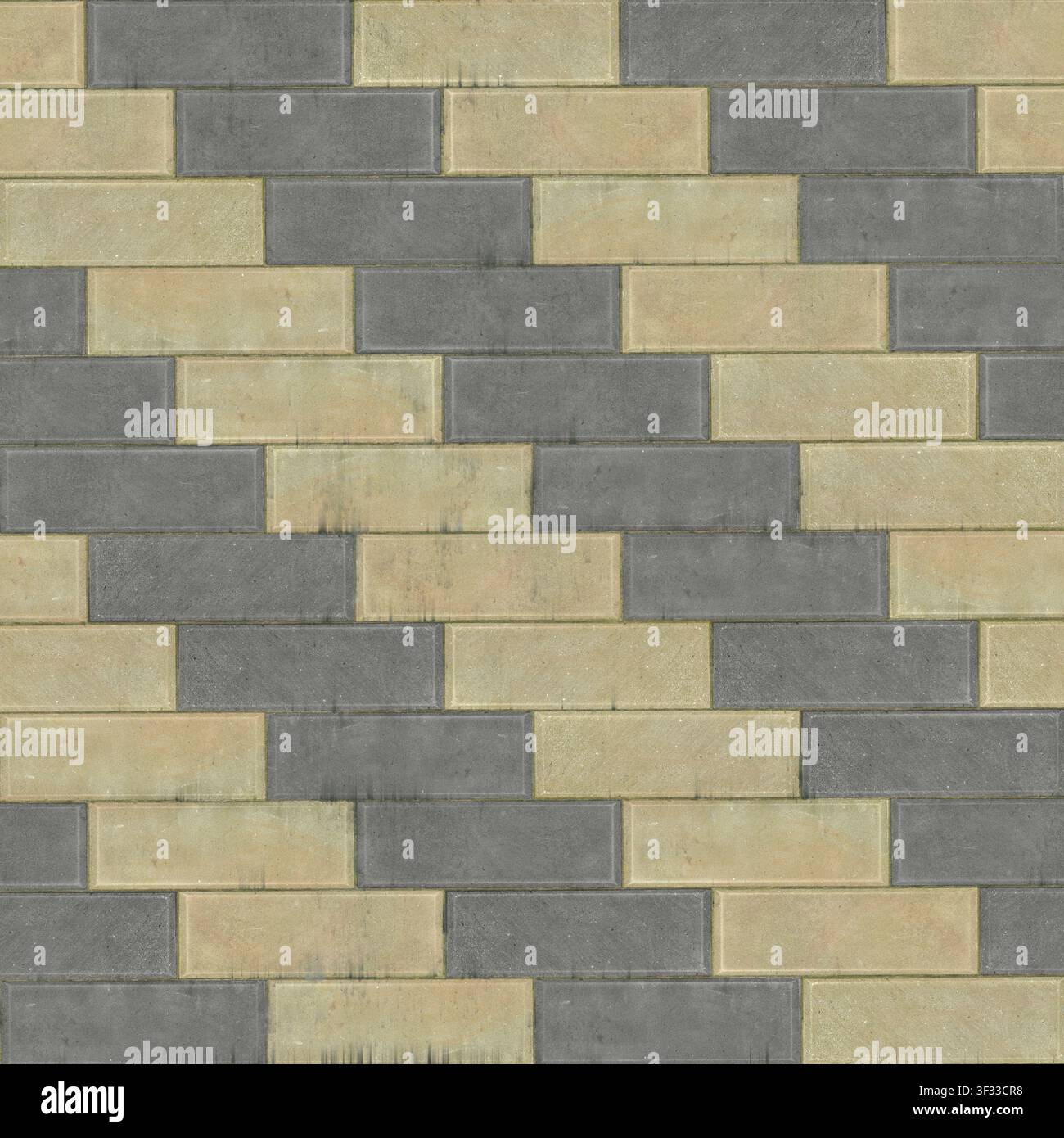 A seamless texture featuring an alternating pattern of beige and grey rectangular bricks. Stock Photo
