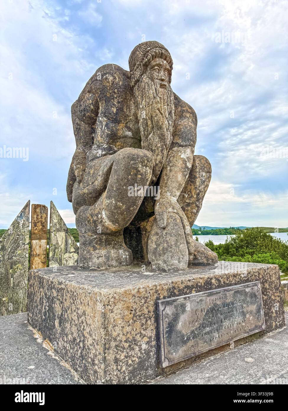 Large stone sculpture of the Connemara Giant at Recess, Connemara, county Galway, Ireland created by Mark Joyce in 1999 for "no apparent reason" - Smartphone Captured Stock Image