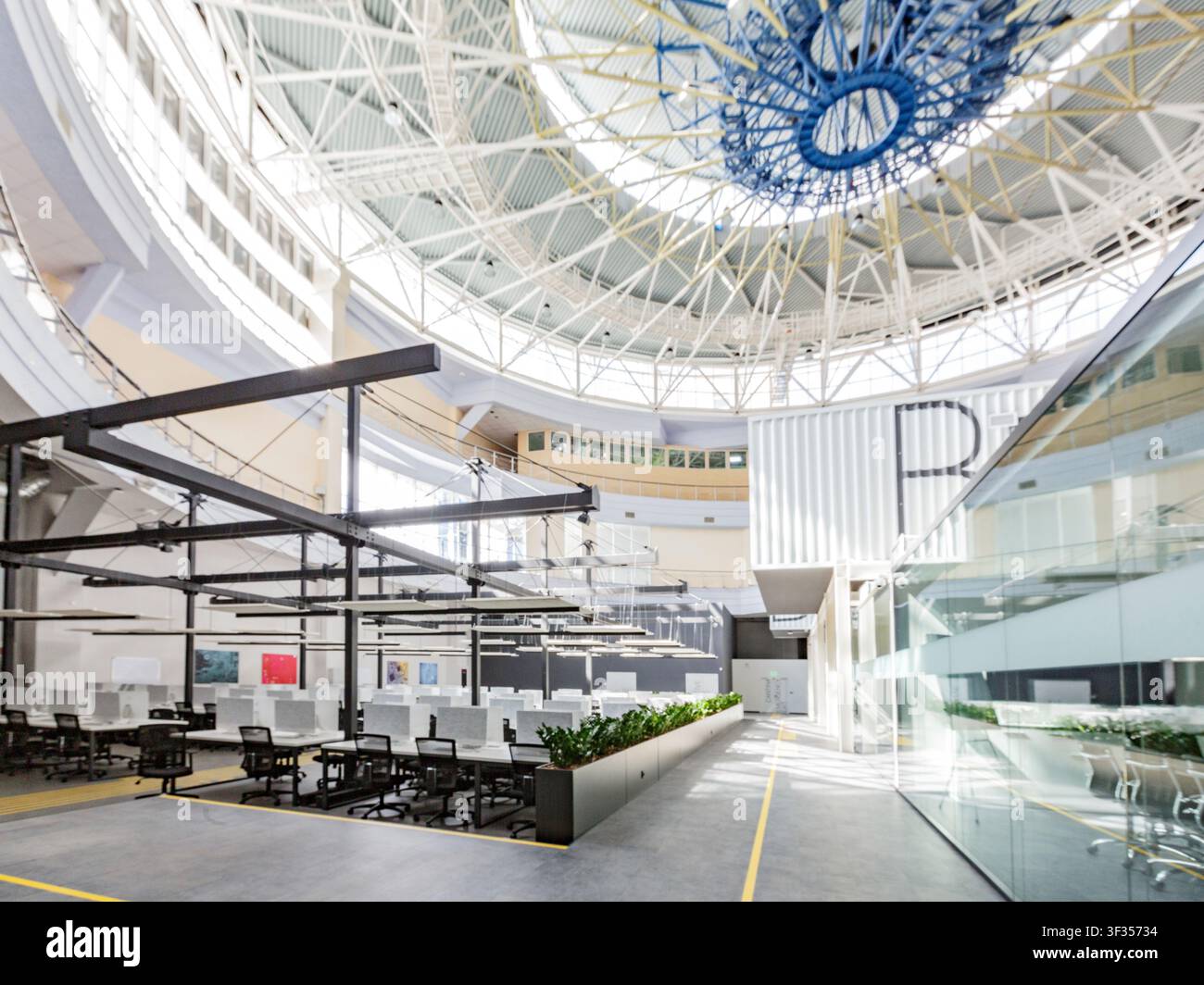 Big rental office with wrapped computers, no workers, copy space Stock Photo