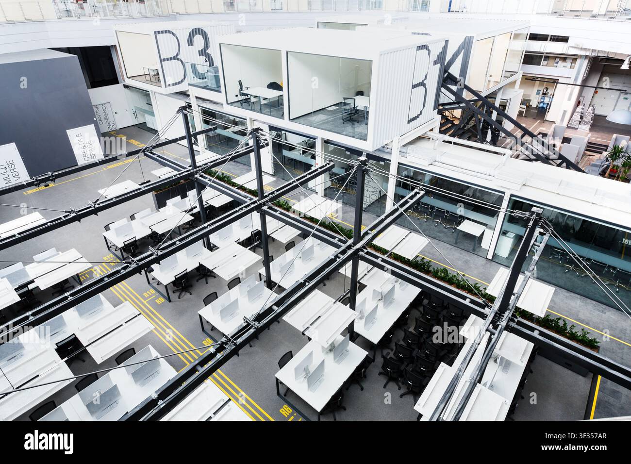 Big open space office with covered computers Stock Photo