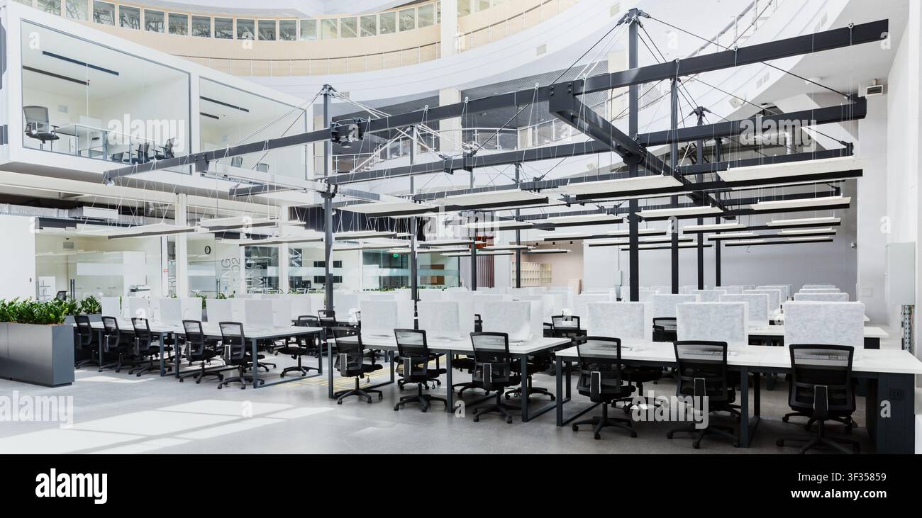 Modern office interior with green plants and computers Stock Photo