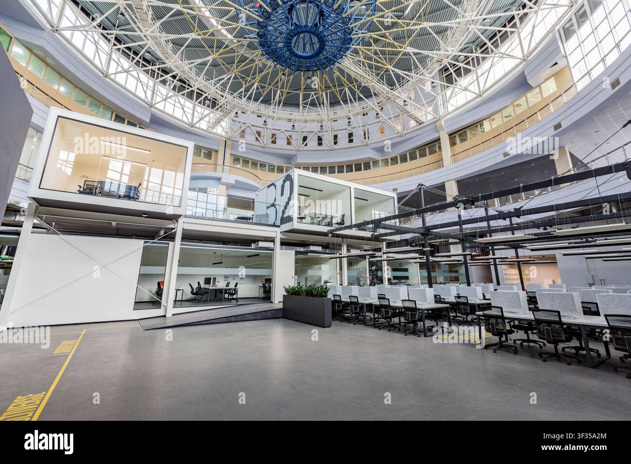 Big rental office with wrapped computers and without workers Stock Photo