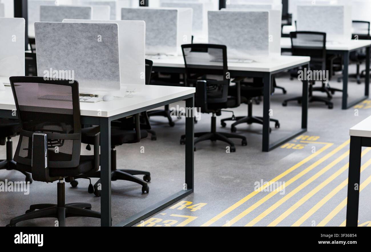 Modern office for workers with open space and computers Stock Photo
