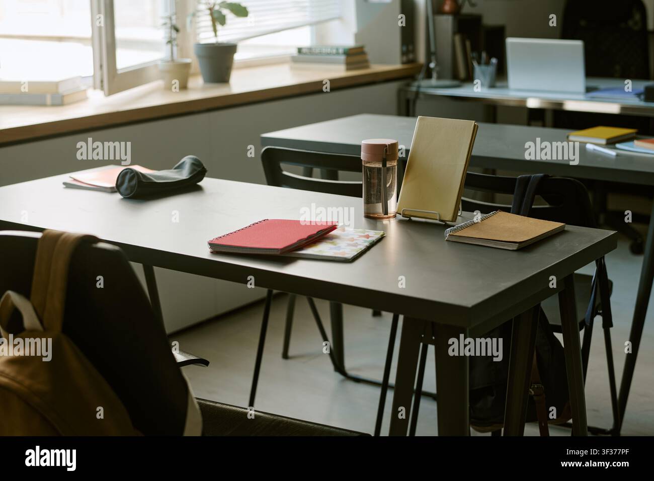 Study Materials Arranged in Classroom for Learning Stock Photo