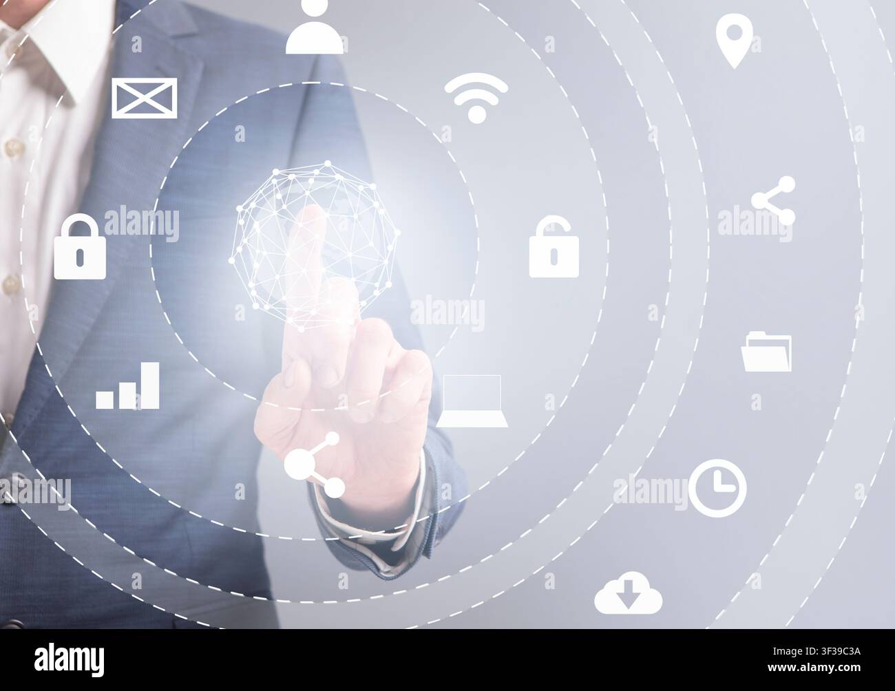 Business man in suit pressing button on infographic panel Stock Photo