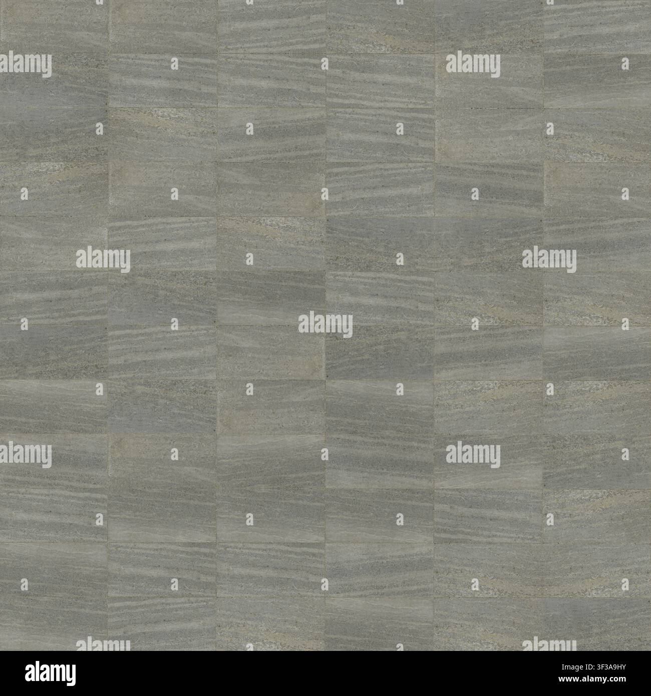 Grid arrangement of rectangular grey textured stone tiles creating a clean architectural surface texture. Stock Photo