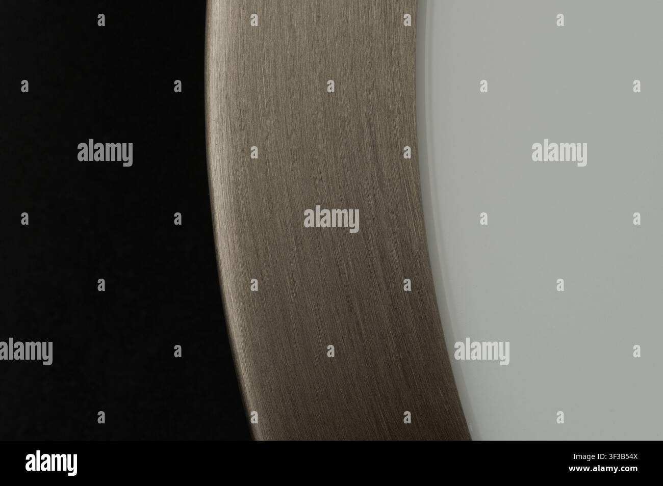 Clean brushed metal surface in plastic frame macro close up view Stock Photo
