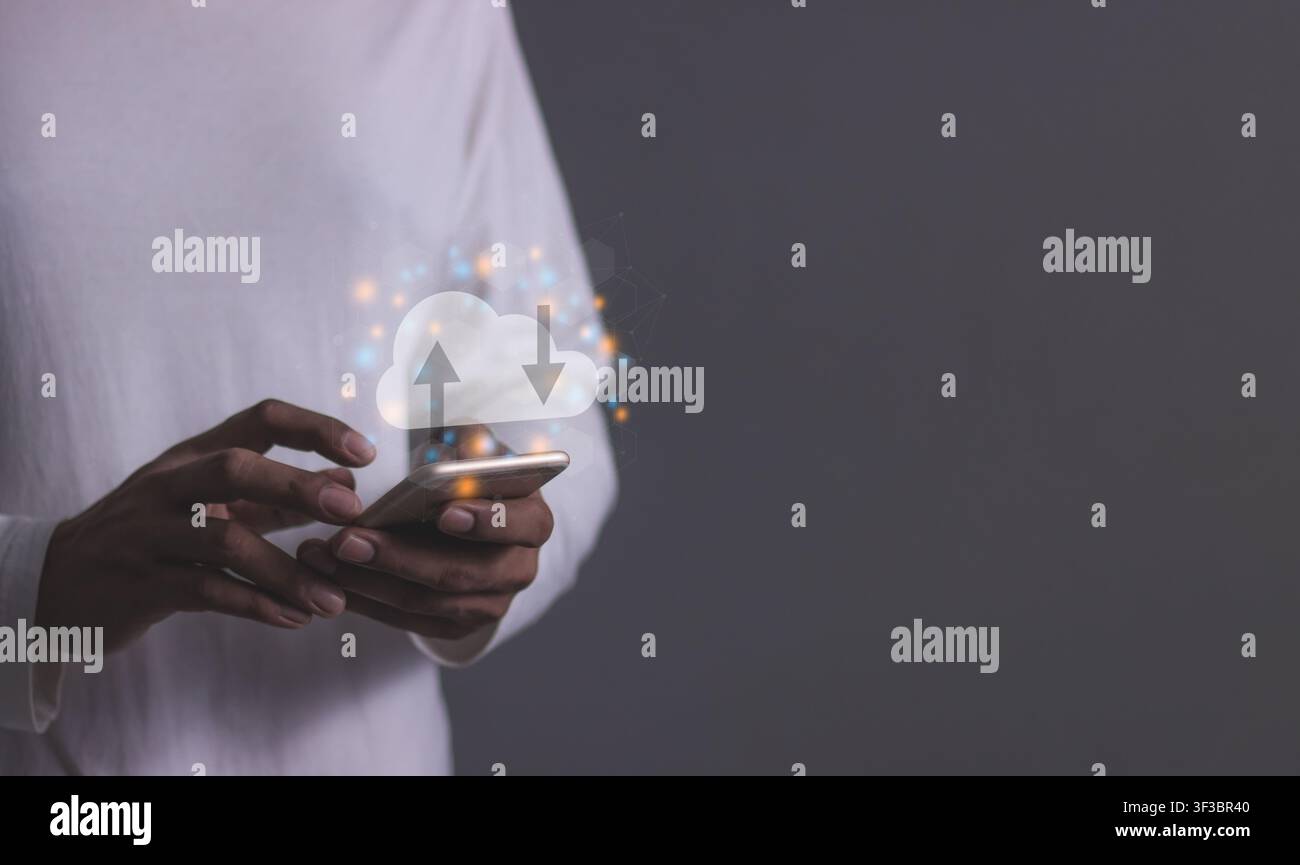 Young Man touch cloud computing diagram and laptop computer notebook in hand, Data storage, Cloud technology, Cloud Computing Storage Stock Photo