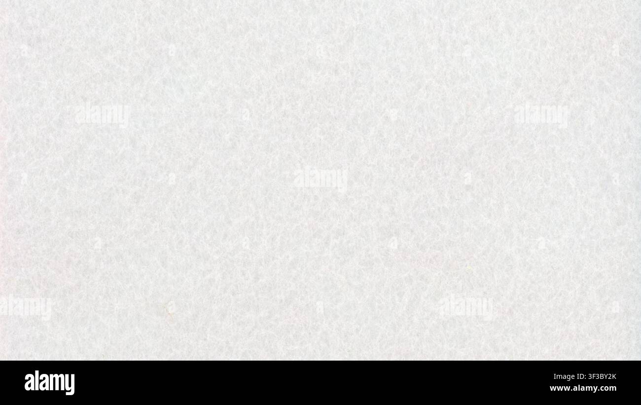 off white felt non woven fabric texture useful as a background Stock Photo