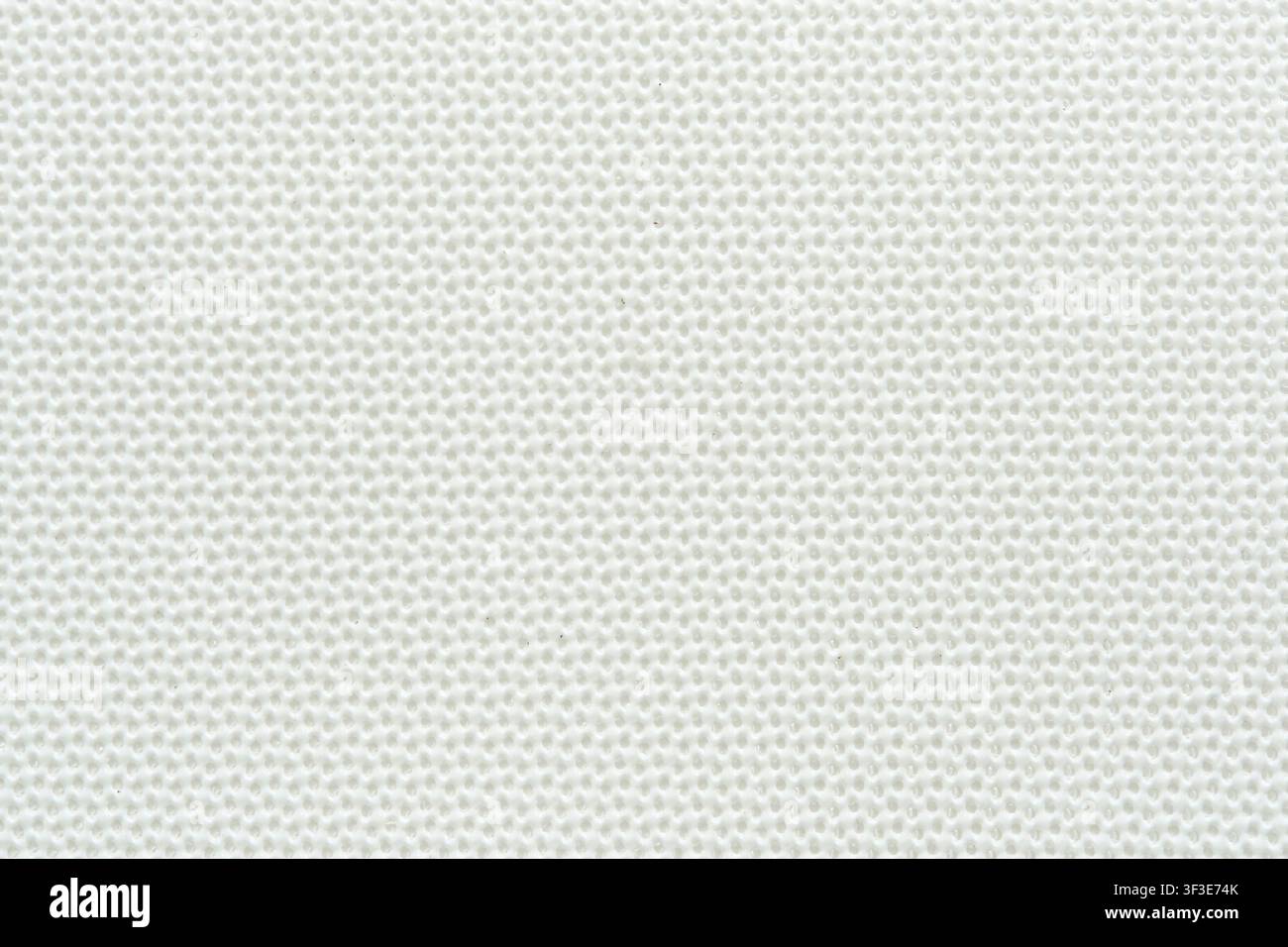Clean white textured background surface with subtle fine grid mesh pattern close up Stock Photo