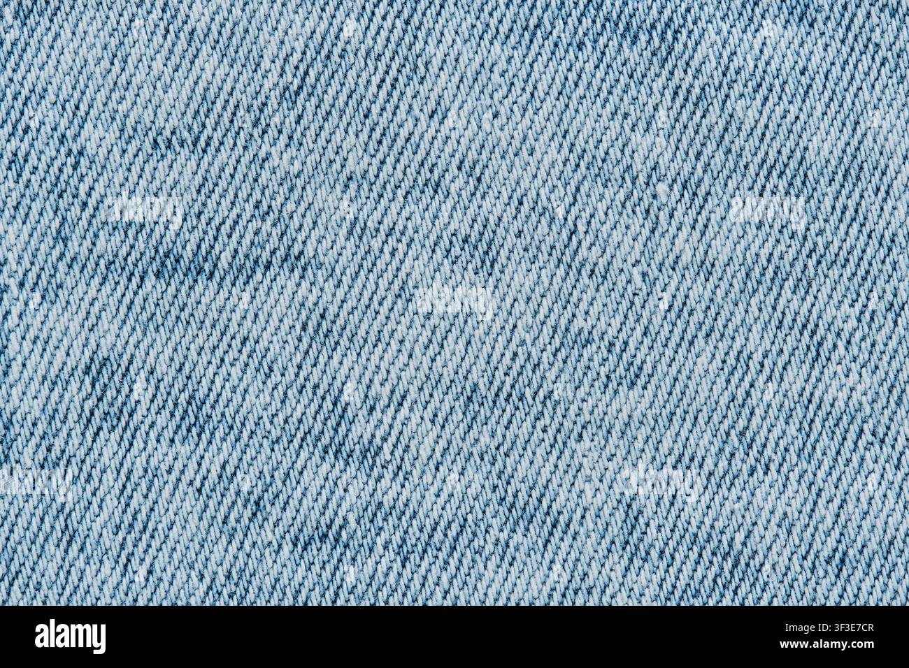 Seamless macro background texture light blue washed denim fabric material Stock Photo