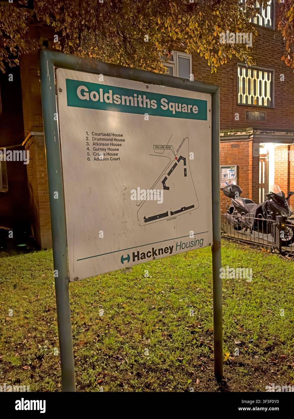 Estate map and Hackney Housing sign at Goldsmiths Square, highlighting safety after dark on London & other UK inner city housing estates. Stock Photo