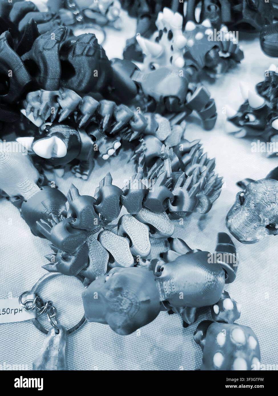 Art models printed on 3D printer. Different objects created on 3D printer from molten plastic. 3D printed different objects. Modern new modern additive progressive technologies. 3D printing technology Stock Photo