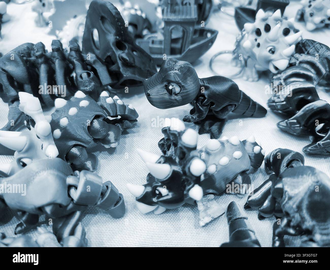 Art models printed on 3D printer. Different objects created on 3D printer from molten plastic. 3D printed different objects. Modern new modern additive progressive technologies. 3D printing technology Stock Photo