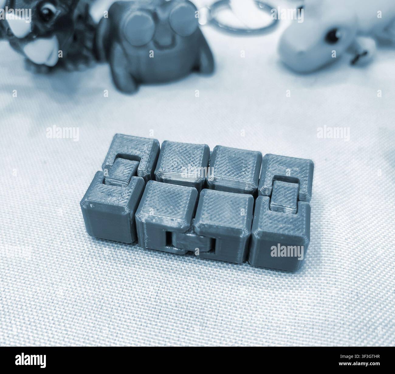 Art models printed on 3D printer. Different objects created on 3D printer from molten plastic. 3D printed different objects. Modern new modern additive progressive technologies. 3D printing technology Stock Photo
