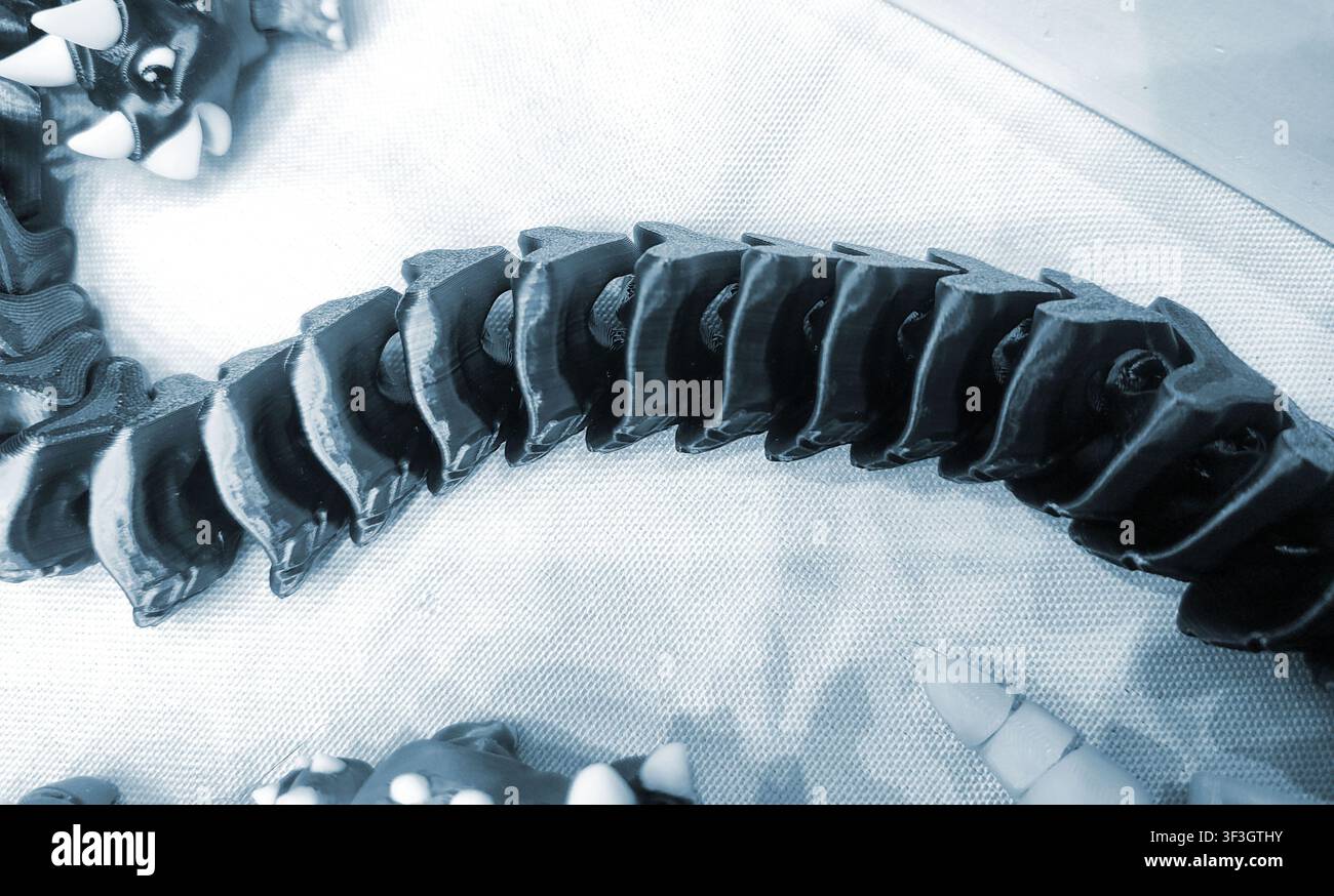 Art models printed on 3D printer. Different objects created on 3D printer from molten plastic. 3D printed different objects. Modern new modern additive progressive technologies. 3D printing technology Stock Photo
