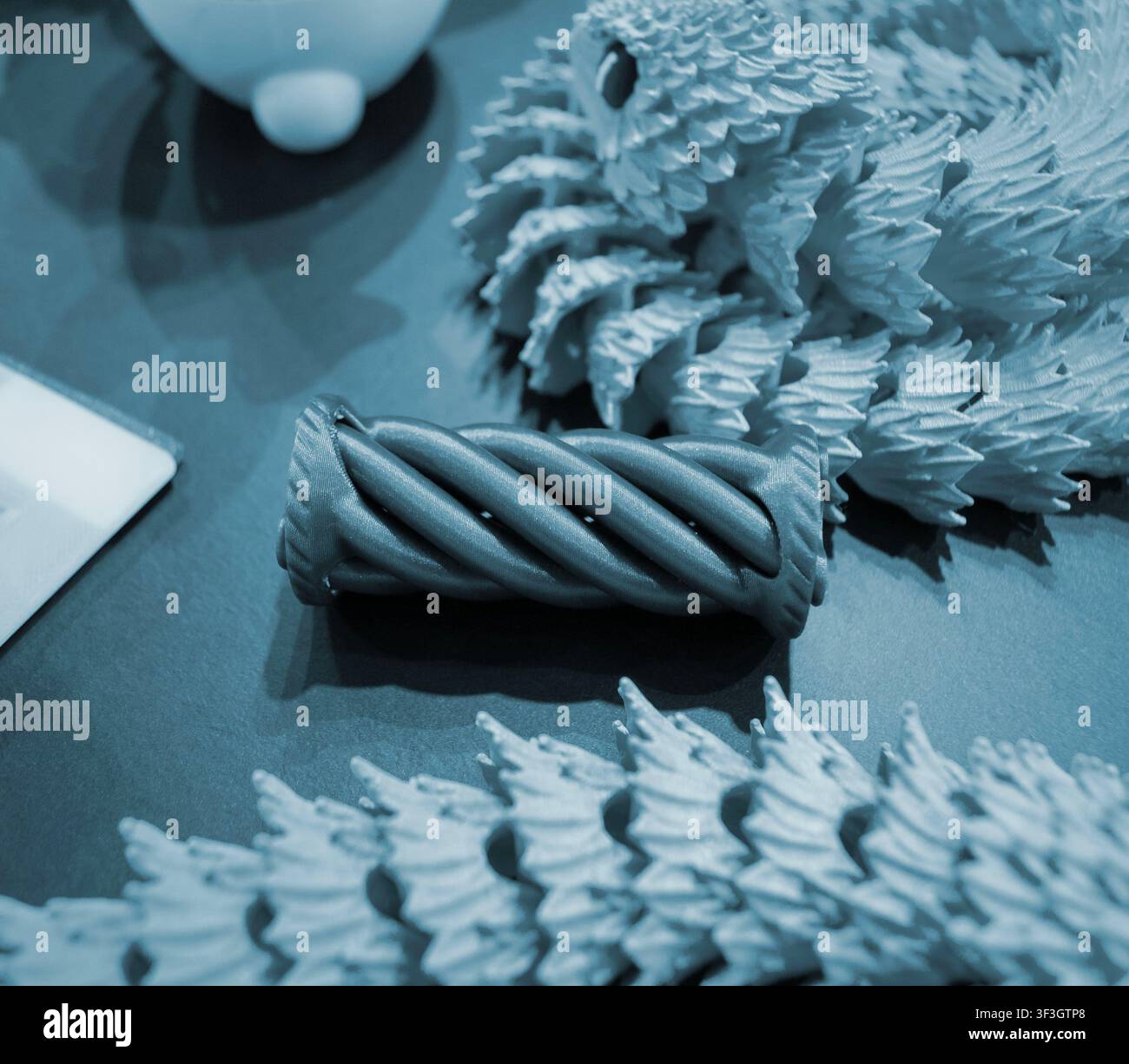 Art models printed on 3D printer. Different objects created on 3D printer from molten plastic. 3D printed different objects. Modern new modern additive progressive technologies. 3D printing technology Stock Photo