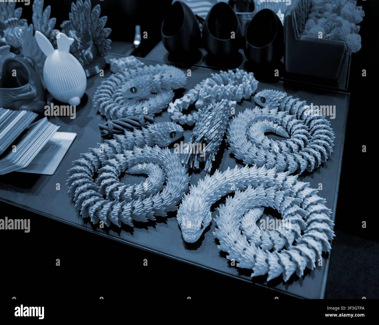 Art models printed on 3D printer. Different objects created on 3D printer from molten plastic. 3D printed different objects. Modern new modern additive progressive technologies. 3D printing technology Stock Photo