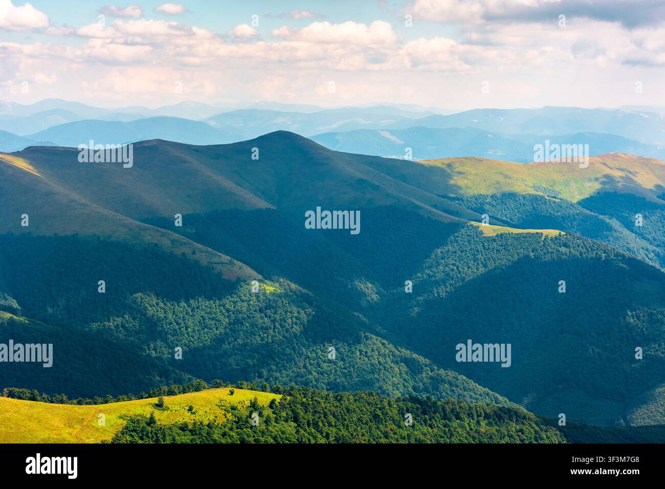 beautiful mountain landscape in summer. travel ukraine background. rolling hill in dappled light. scenic view of borzhava ridge. carpathian mountain s Stock Photo