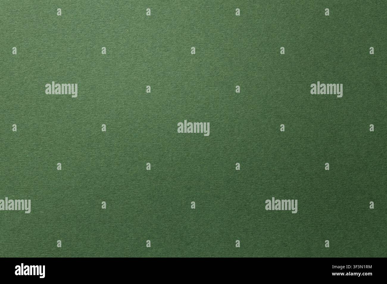 Textured dark green paper background with copy space for design projects Stock Photo