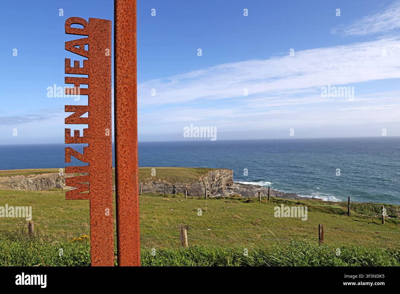 Weathered Mizen Head marker overlooking the Atlantic Ocean at Mizen Head on the Wild Atlantic Way in West Cork, Ireland. Stock Photo
