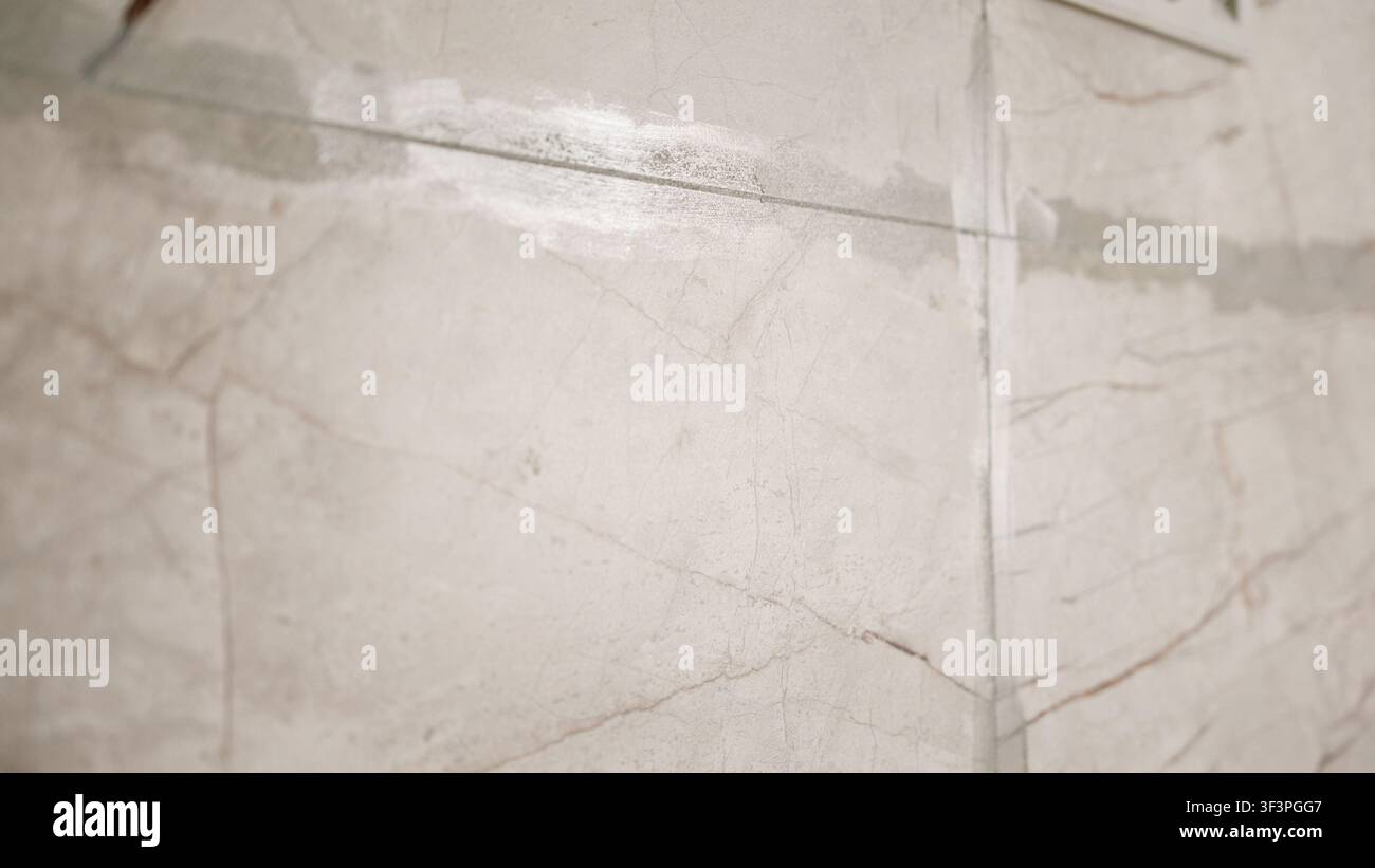 Marble texture with beige and brown veining on polished surface Stock Photo