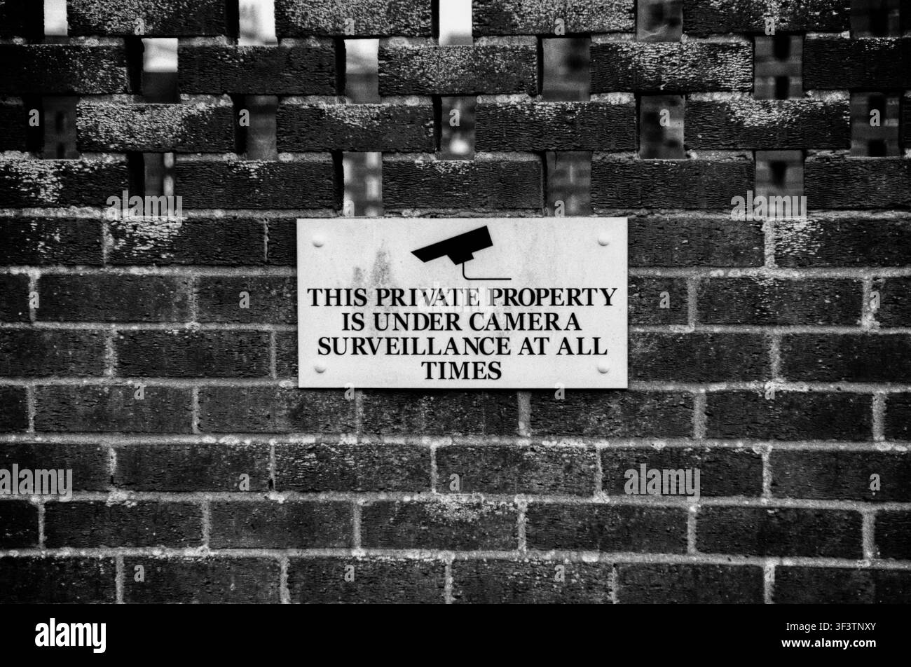 Sign warning property under CCTV surveillance Stock Photo