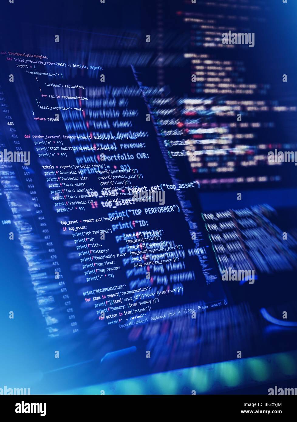 Dynamic FinTech programming code with motion blur. High-frequency trading algorithm and financial stock analytics python script on dark computer scree Stock Photo