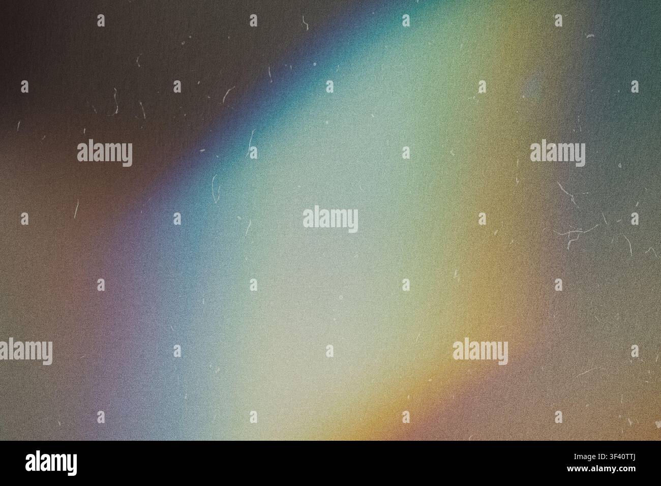 Abstract background showing colorful light leak effect with dust and grain Stock Photo