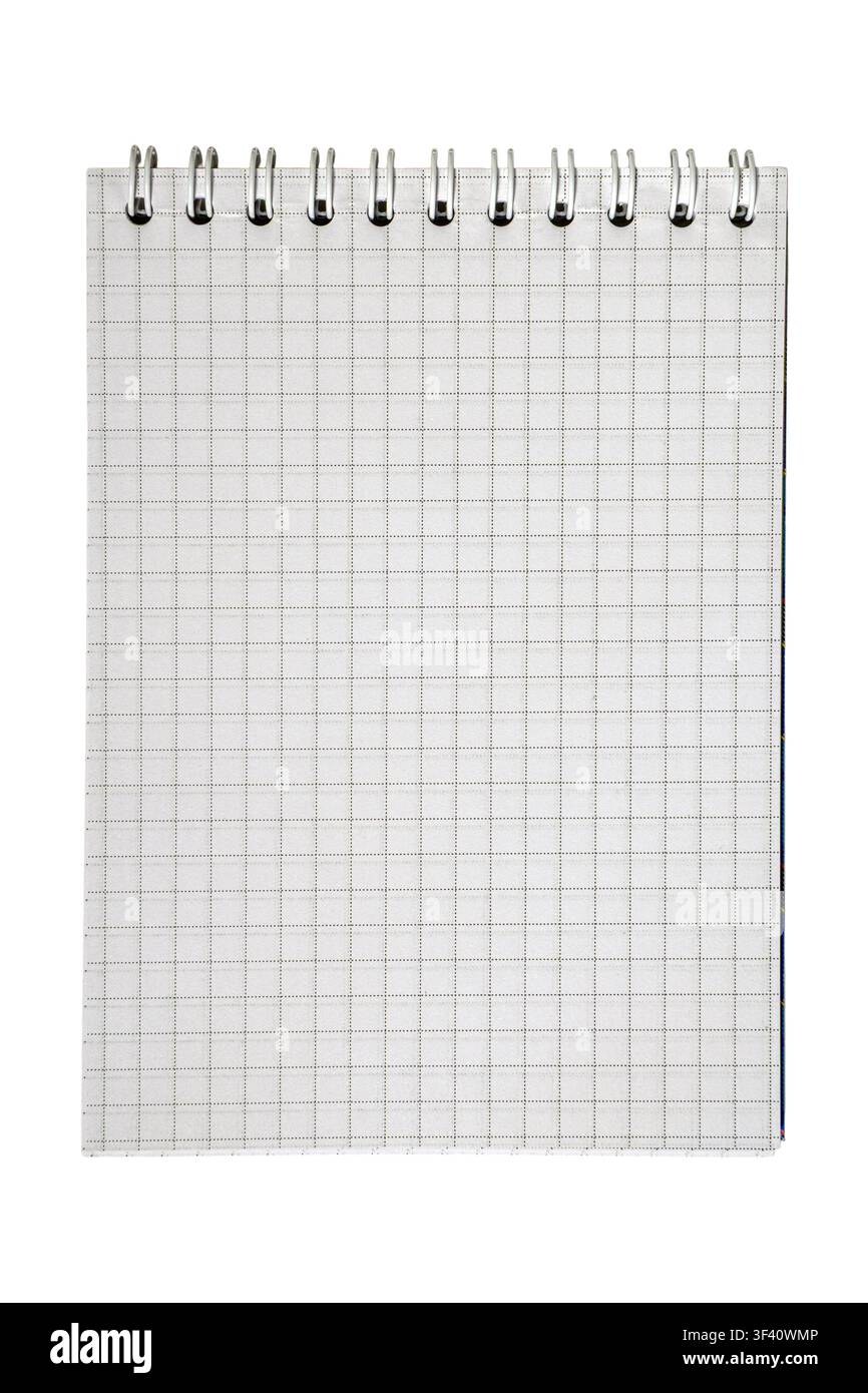 Blank squared notebook page with metallic spiral binding for plotting Stock Photo