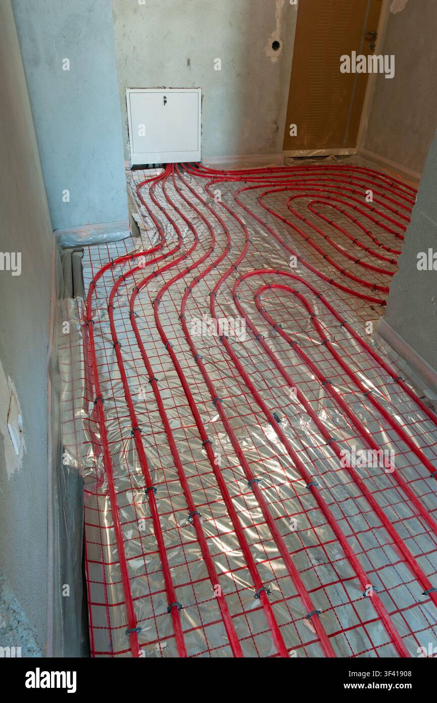 Underfloor surface heating pipes. Low temperature heating concept Stock Photo